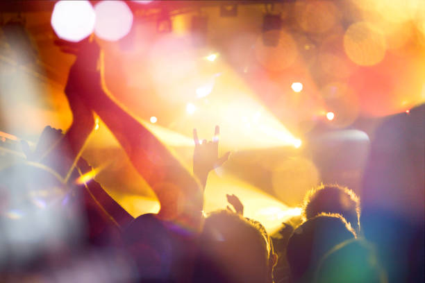 istock Filming concert on smart phone 1002917334