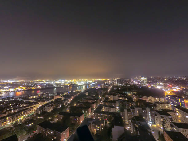 istock Hamburg Germany cityscape in night time 1002918188