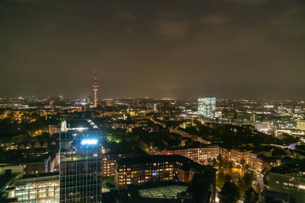 istock Hamburg Germany cityscape in night time 1002918296