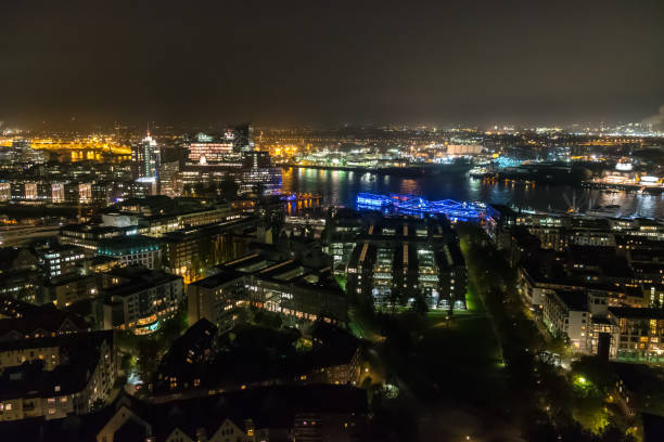 istock Hamburg Germany cityscape in night time 1002918480