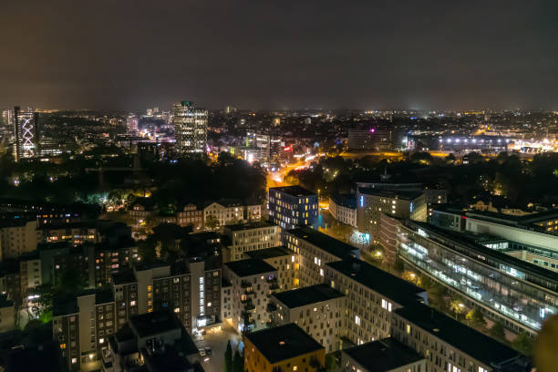 istock Hamburg Germany cityscape in night time 1002918556