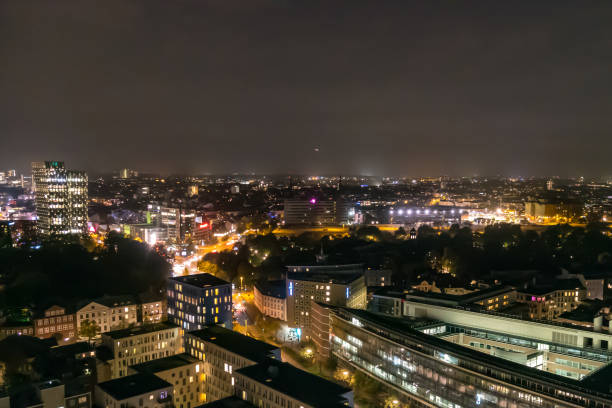 istock Hamburg Germany cityscape in night time 1002920688
