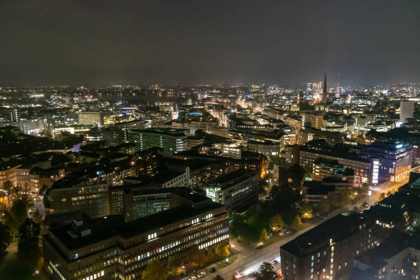 istock Hamburg Germany cityscape in night time 1002920726