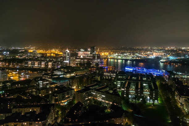istock Hamburg Germany cityscape in night time 1002920810