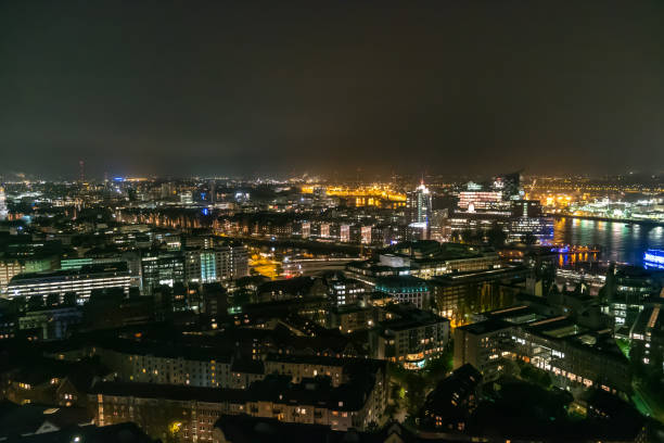 istock Hamburg Germany cityscape in night time 1002920814