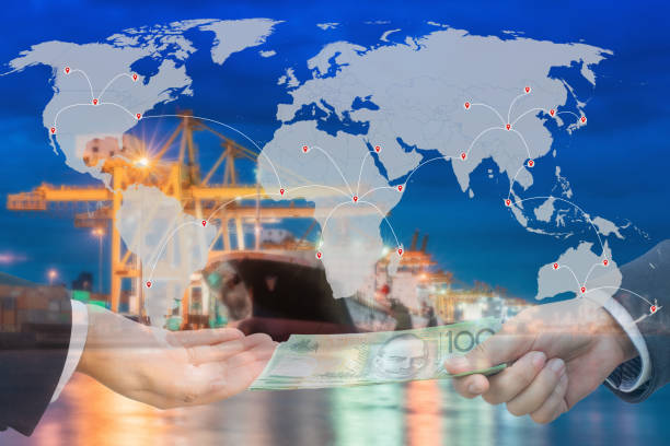 istock Shipping and world map with business agreement on blur ship crane and container for export or logistic background, Part of this image furnished by NASA 1002921282