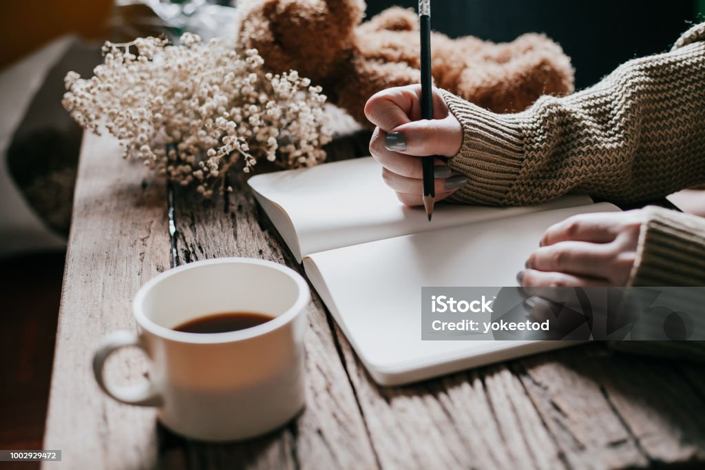 Close Up Of Womans Hands Writing On Book Vintage Color Tone Stock Photo -  Download Image Now - iStock