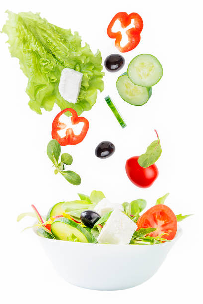 Vegetarian salad. Vegetarian salad. arugula falling stock pictures, royalty-free photos & images