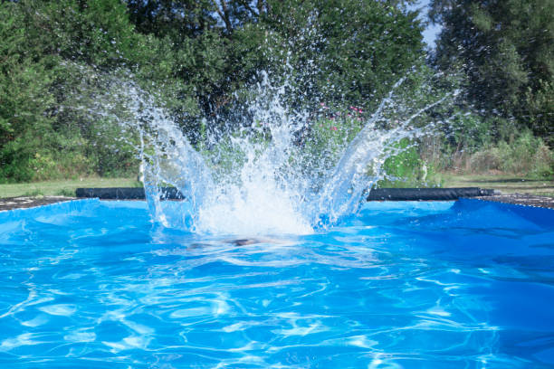 istock Water splash making by person jumping 1002931894