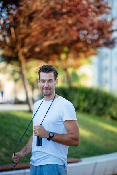 istock Portrait of a handsome man with skip-rope 1002937436