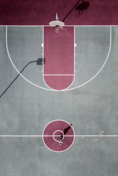 istock Boy on a Basketball Court 1002937564