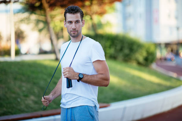 istock Man skipping rope in the park 1002939624