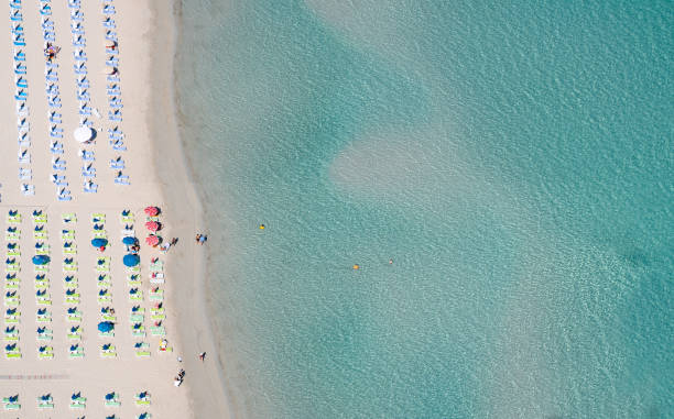 istock aegean beach from above with people 1002940184