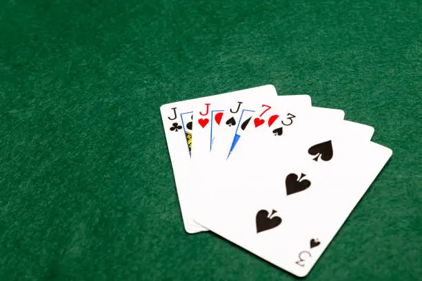 Three of a kind, the seventh highest hand in poker.
Three cards of the same value supported by any other two cards