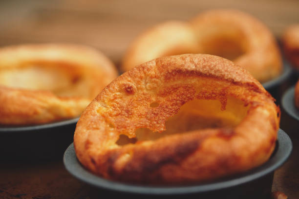 freshly cooked yorkshire puddings. - yorkshire pudding imagens e fotografias de stock