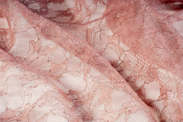 istock Lace on the fabric. tissue, textile, cloth, fabric, material, texture 1002993674
