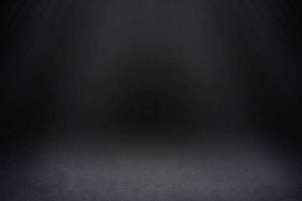 istock Dark Background with a Spotlight in the Center 1002993810