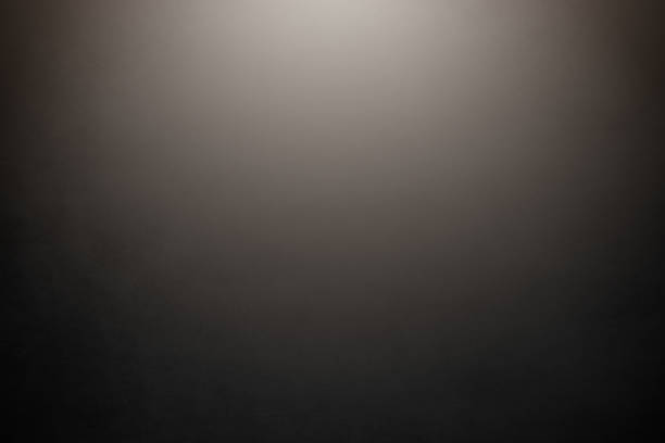 istock Monochrome Background with a Spotlight in the Center 1002993842