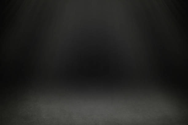 istock Dark Background with a Spotlight in the Center 1002995898