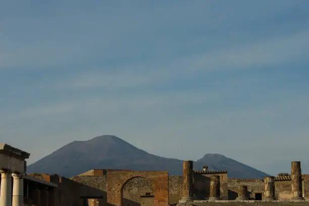 Photo of old ancient ruins of Pompeii city destroyed by Vesuvius volcano. most popular and famous place in italy