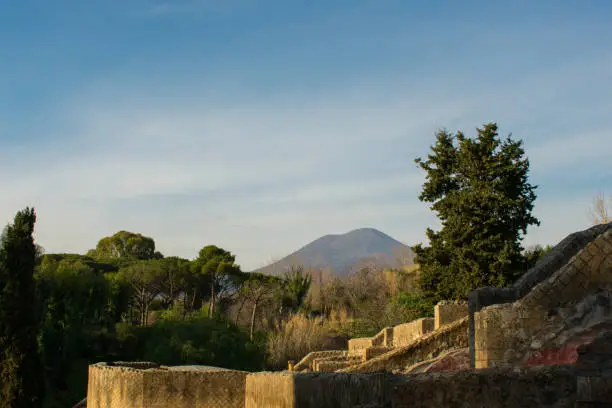 Photo of old ancient ruins of Pompeii city destroyed by Vesuvius volcano. most popular and famous place in italy