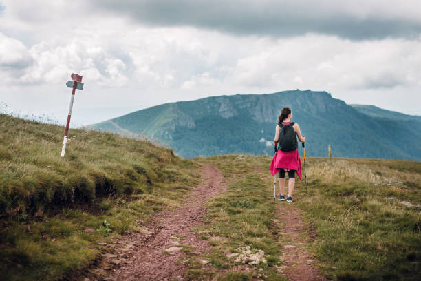 istock Girl at mountain walk 1003048252