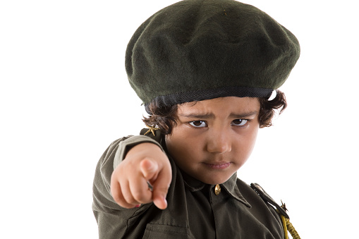Little girl in police costume pointing