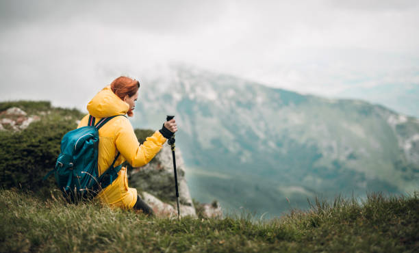 istock Hiking on foggy cloudy day 1003064108
