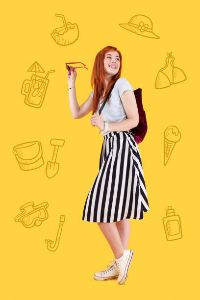 istock Emotional tourist feeling excited while thinking about her seaside rest 1003089742