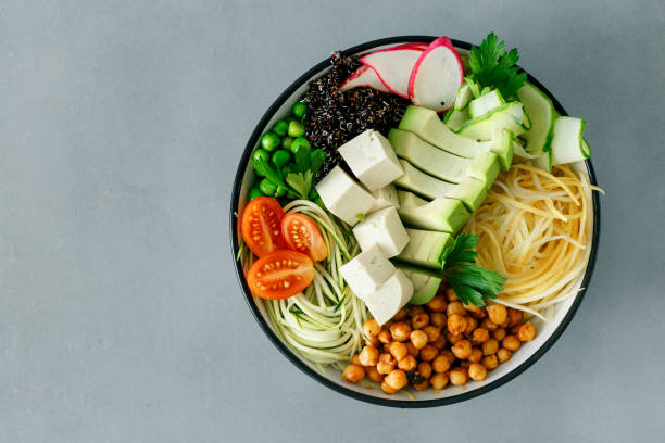 istock Healthy Bowl of buddha with spiralized vegetables copy space top view 1003089800