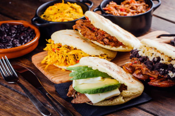 istock Latin American breakfast, Arepas with several ingredients. 1003089936