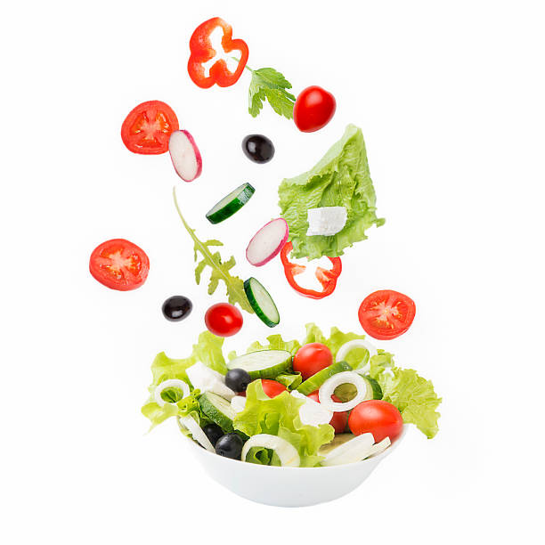 Vegetarian salad. Vegetarian salad. arugula falling stock pictures, royalty-free photos & images