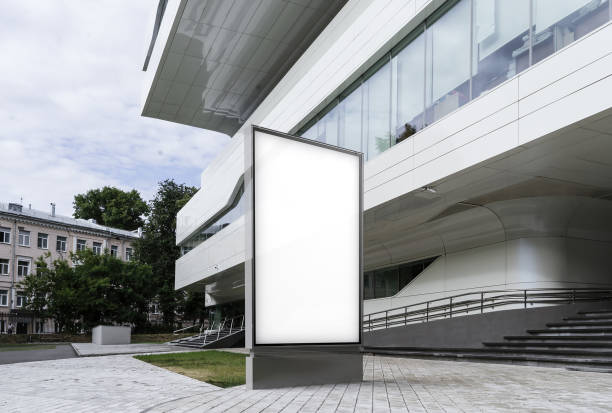 istock Blank white banner next to modern business center. 3d rendering 1003110792