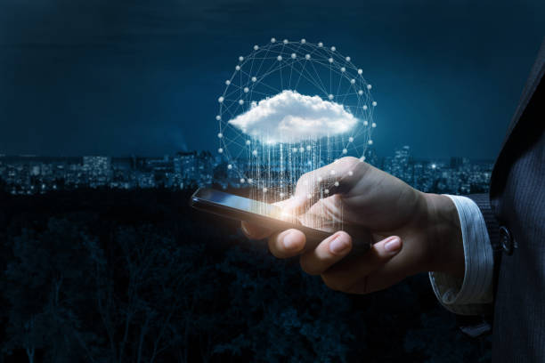 istock Businessman downloads it from the cloud information . 1003111638