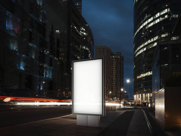 istock Blank illuminated banner at night time in the city. 3d rendering 1003112208