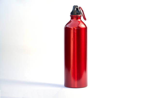 istock Colored bicycle water bottle isolated on white background 1003118924