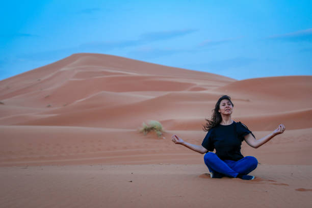istock Yoga in Desert. 1003119864