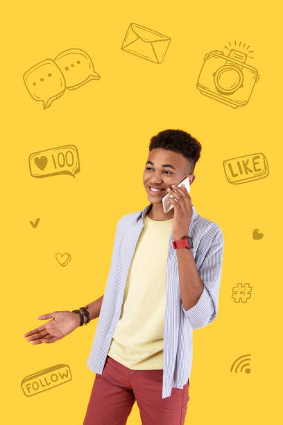 istock Famous blogger talking on the phone and smiling 1003121786