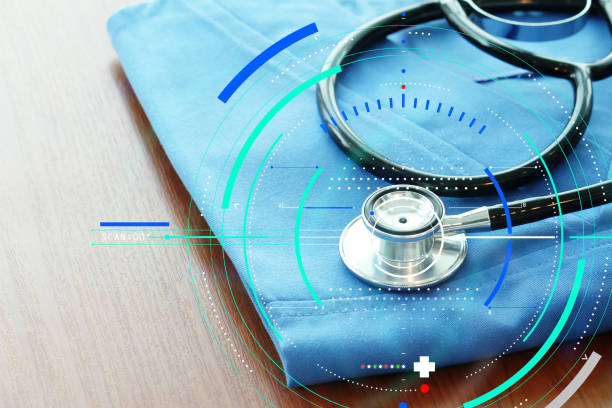 istock Stethoscope with blue doctor coat on wooden table and  background 1003123438