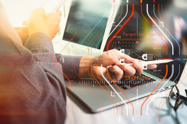 istock business concept.Businessman working stock exchange project modern office.Laptop computer digital table and smart phone.Internet connection technology. sun flare effect photo 1003129958