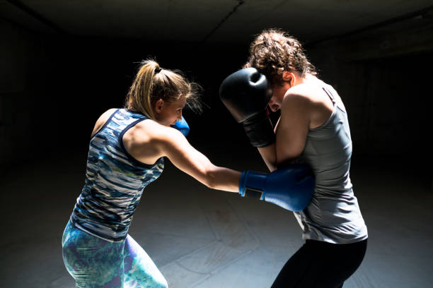 istock Two professional kick boxers sparring with each other 1003130318