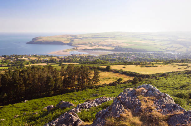 Pembrokeshire coastline Sunrise over Newport bay, Pembrokeshire national park cardigan wales stock pictures, royalty-free photos & images