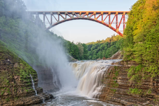istock Waterfall And Railroad Bridge At Letchworth State Park In New York 1003140012