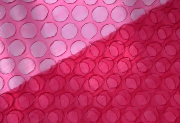 Photo of Red Pink Bubble Wrap Close Up Abstract