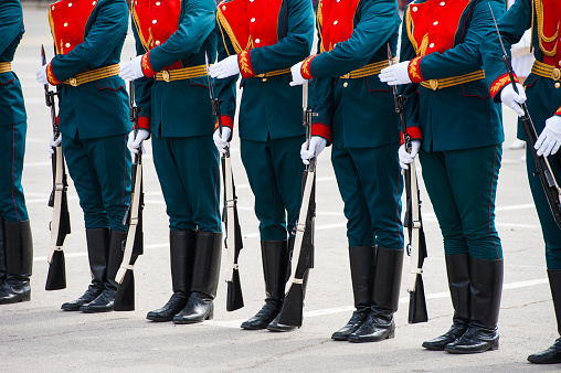 Soldiers in dress uniform marching in the parade