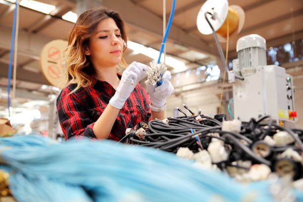 istock Woman working in a factory 1003150778
