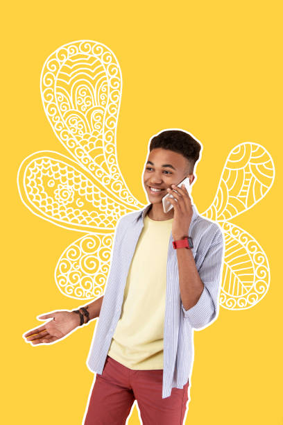 istock Cheerful young person smiling while talking on the phone 1003153520