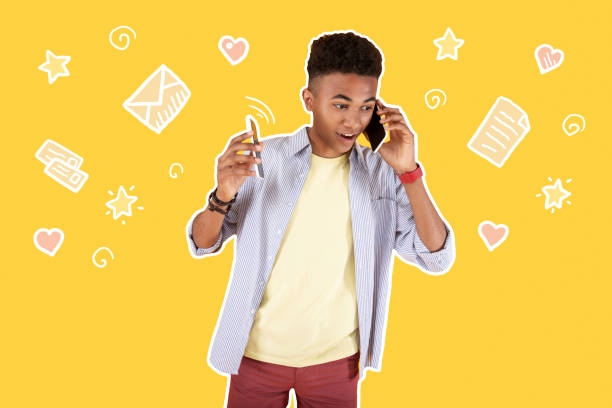 istock Excited student holding a smartphone and getting an urgent call 1003153528
