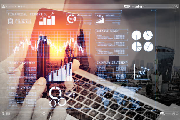 istock double exposure of hand using smart phone,laptop, online banking payment communication network technology 4.0,internet wireless application development sync app,London architecture city 1003153622