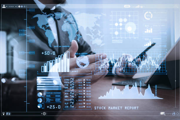 istock Justice and Law context.Male lawyer hand working with smart phone,digital tablet computer docking keyboard with gavel and document on wood table,filter effect 1003154274